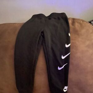 Nike Kids Black Joggers with White Swoosh